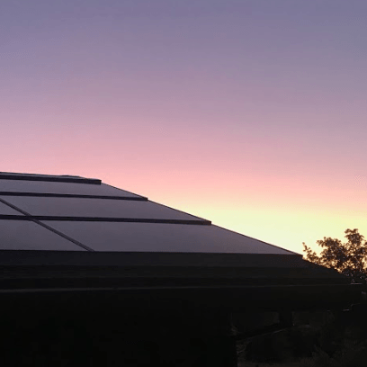 California sunrise behind integrated solar roof