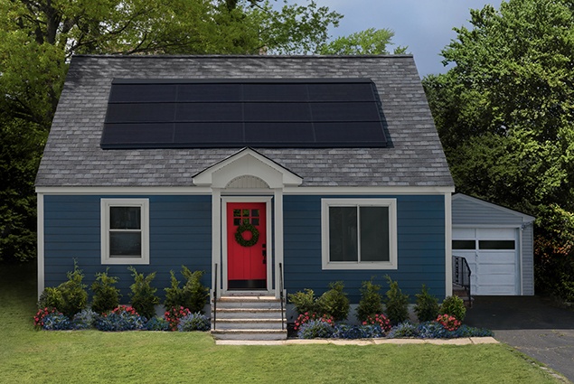 Grey house with garage and integrated solar roof