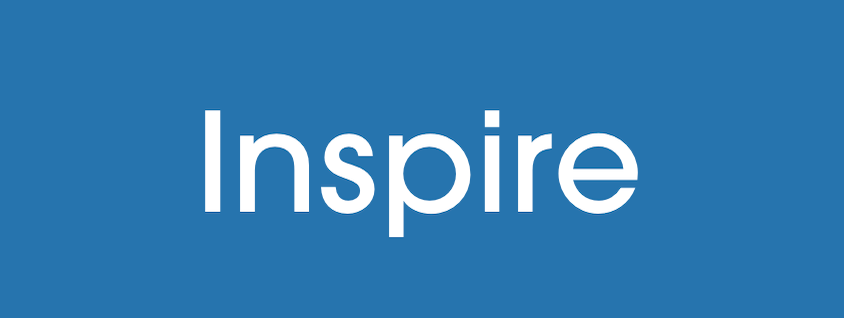 White letters on blue that read "Inspire"