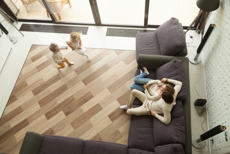 Ceiling shot of family in living room